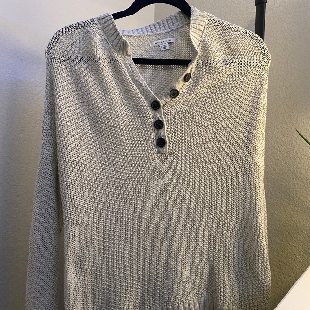 grey button up sweater